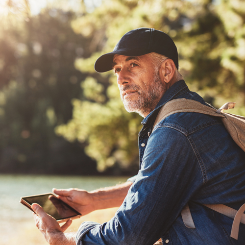 man sitting outside looking at the distance