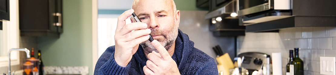 Man testing his blood sugar