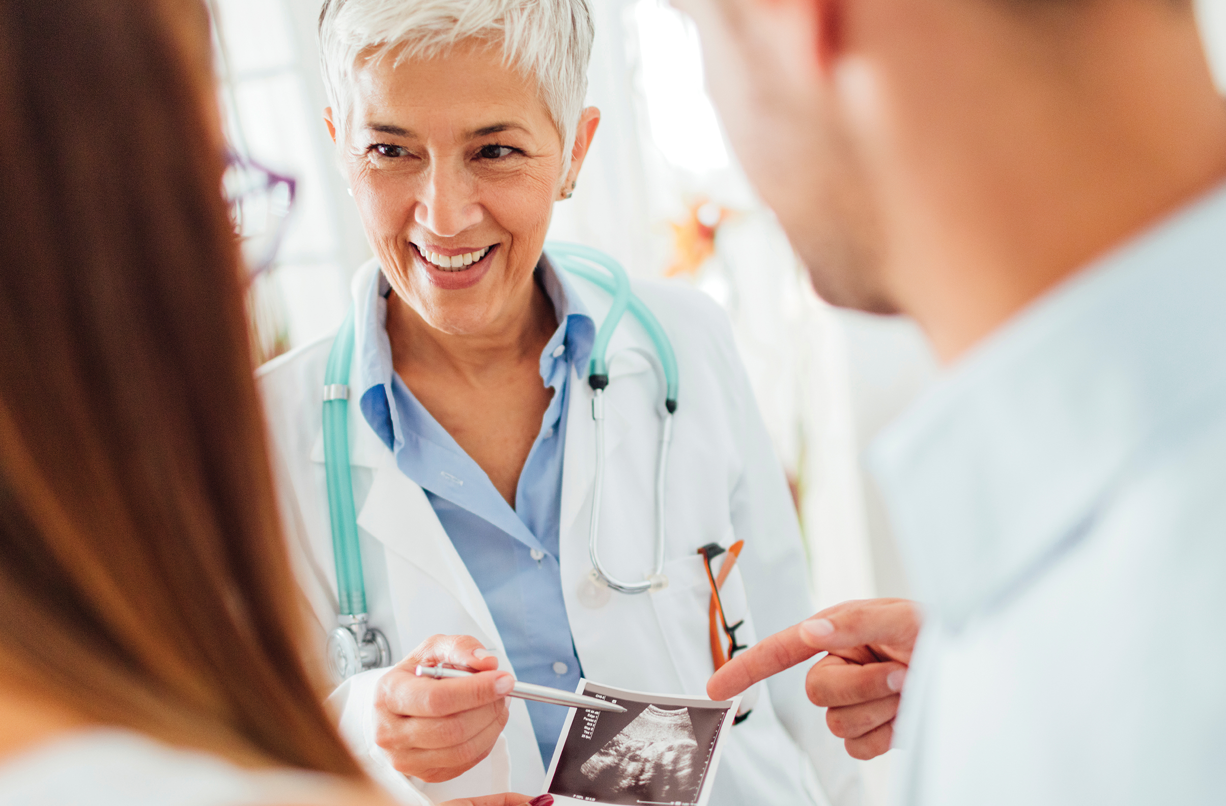 Doctor Meeting With Patients